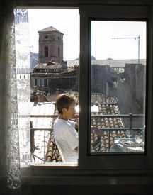 Judy sitting on the balcony